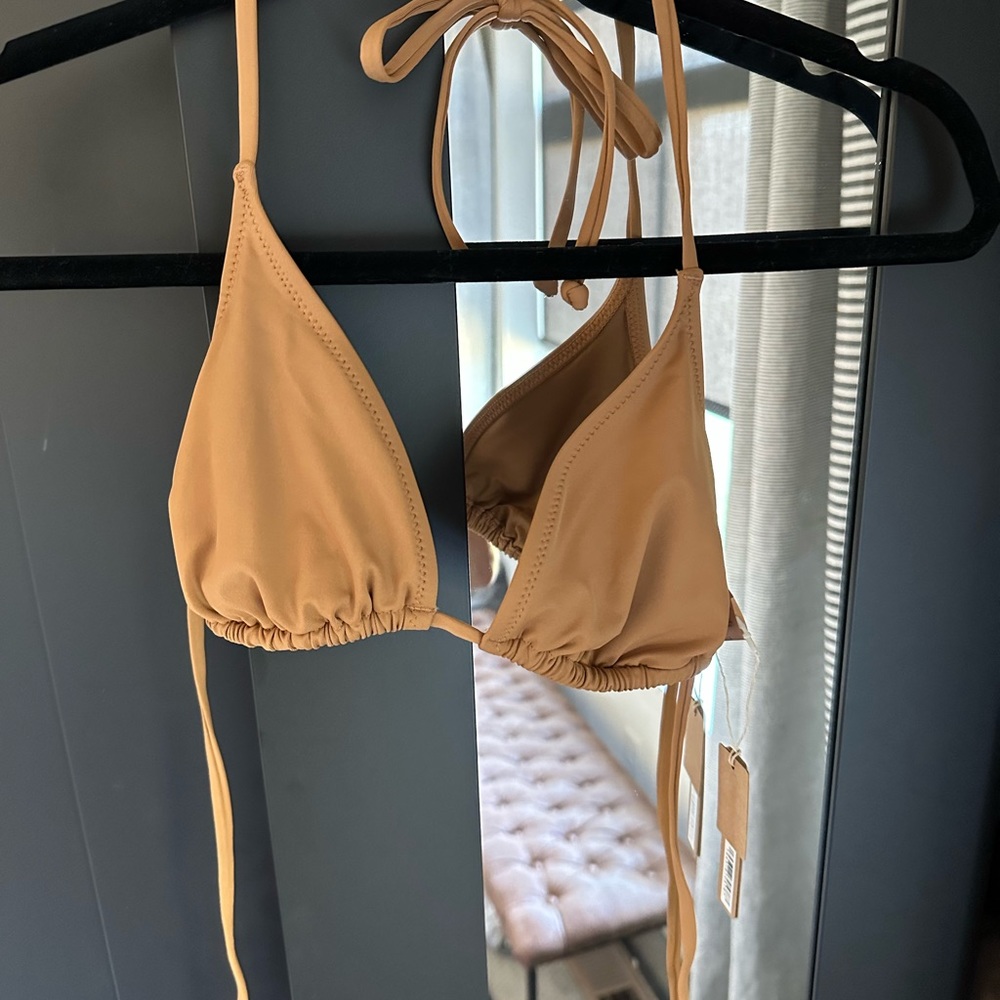 Skims large swim top